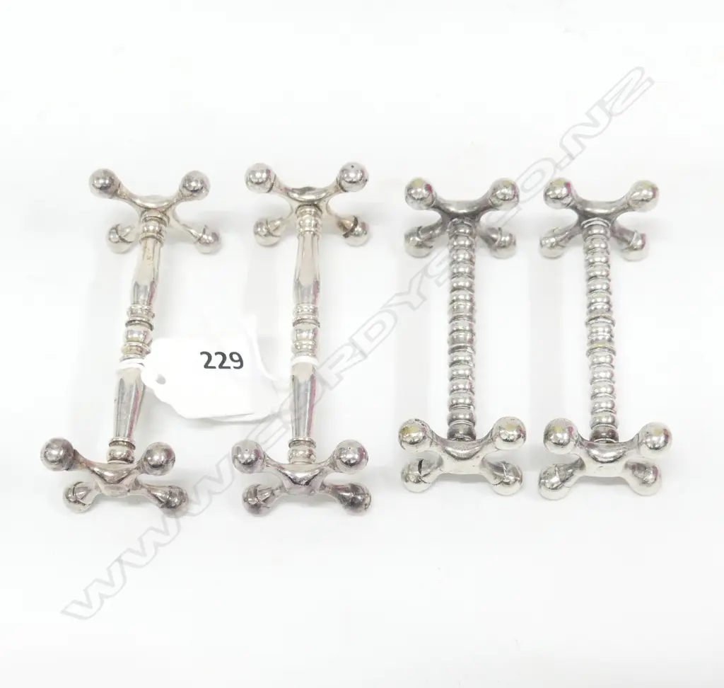 TWO PAIRS OF ANTIQUE SILVER PLATED KNIFE RESTS L. 85MM Image 1++
