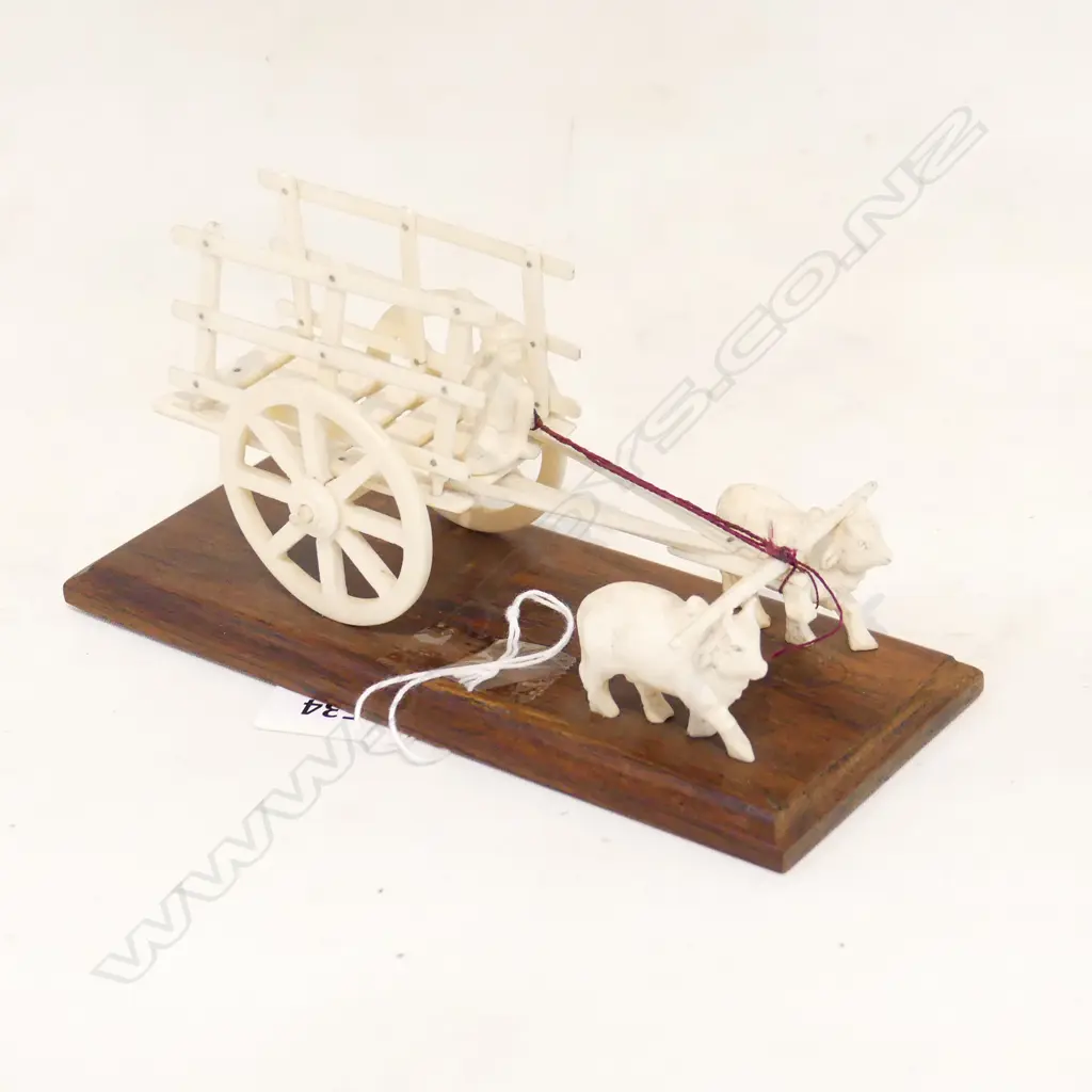 VINTAGE IVORY OX DRAWN CART WITH FIGURE ON WOODEN PLINTH, L.175MM Image 1++