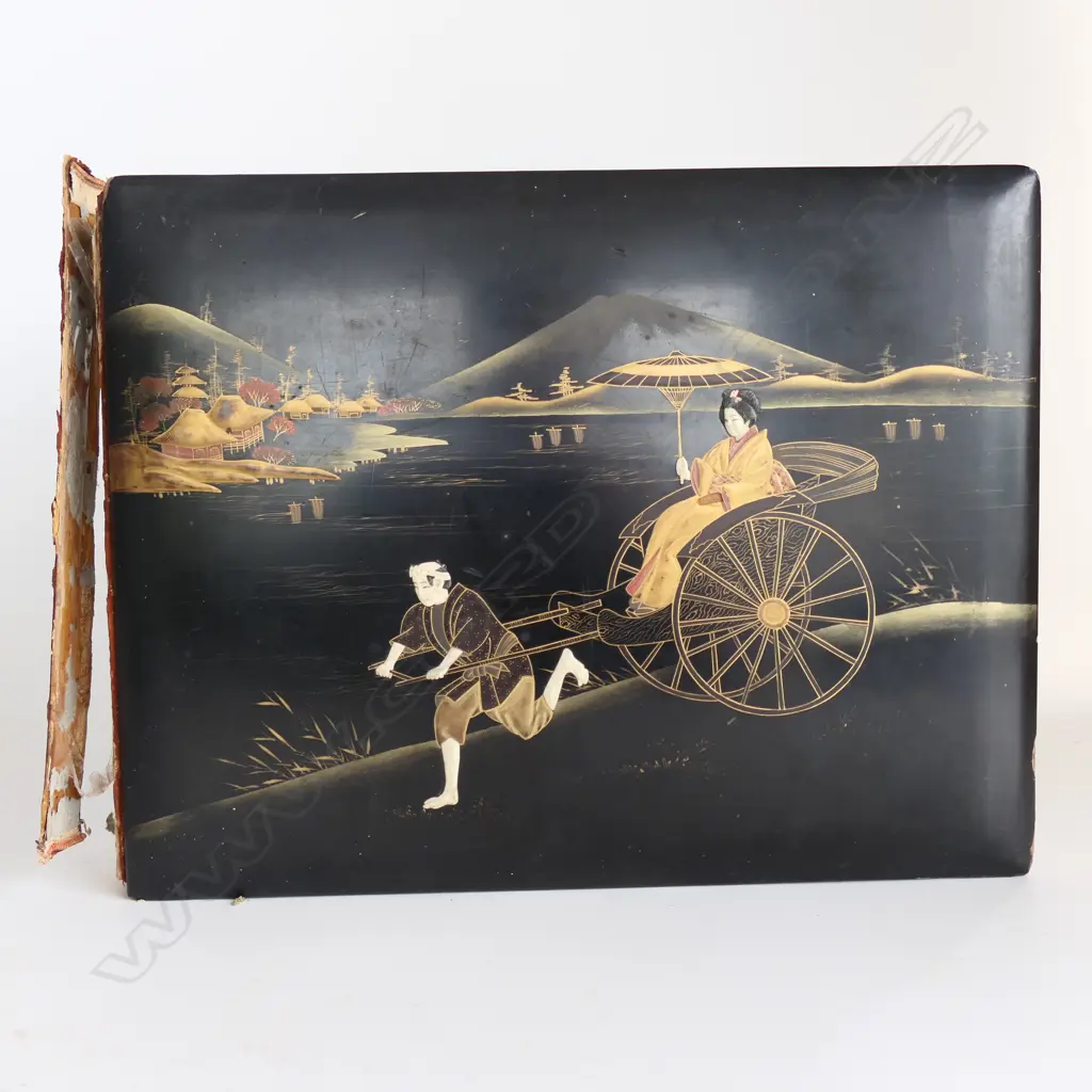 A late 19thC Japanese large photo album the black lacquered cover with a coastal scene including rickshaw insects and florals Image 1++