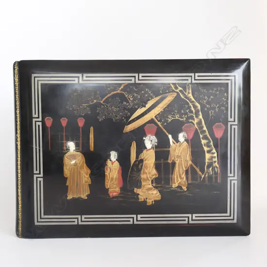 A Japanese Meiji period decorative lacquer postcard album with world postcards