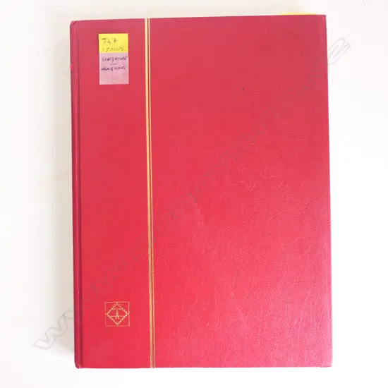 A Lighthouse stamp album of Singapore and Hong Kong stamps