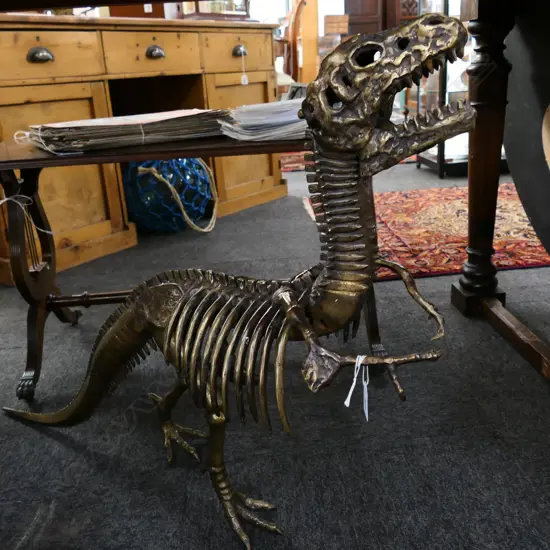 BRONZE SCULPTURE T-REX DINOSAUR SKELETON, DAMAGE TO ONE ARM, H.620mm L.800mm