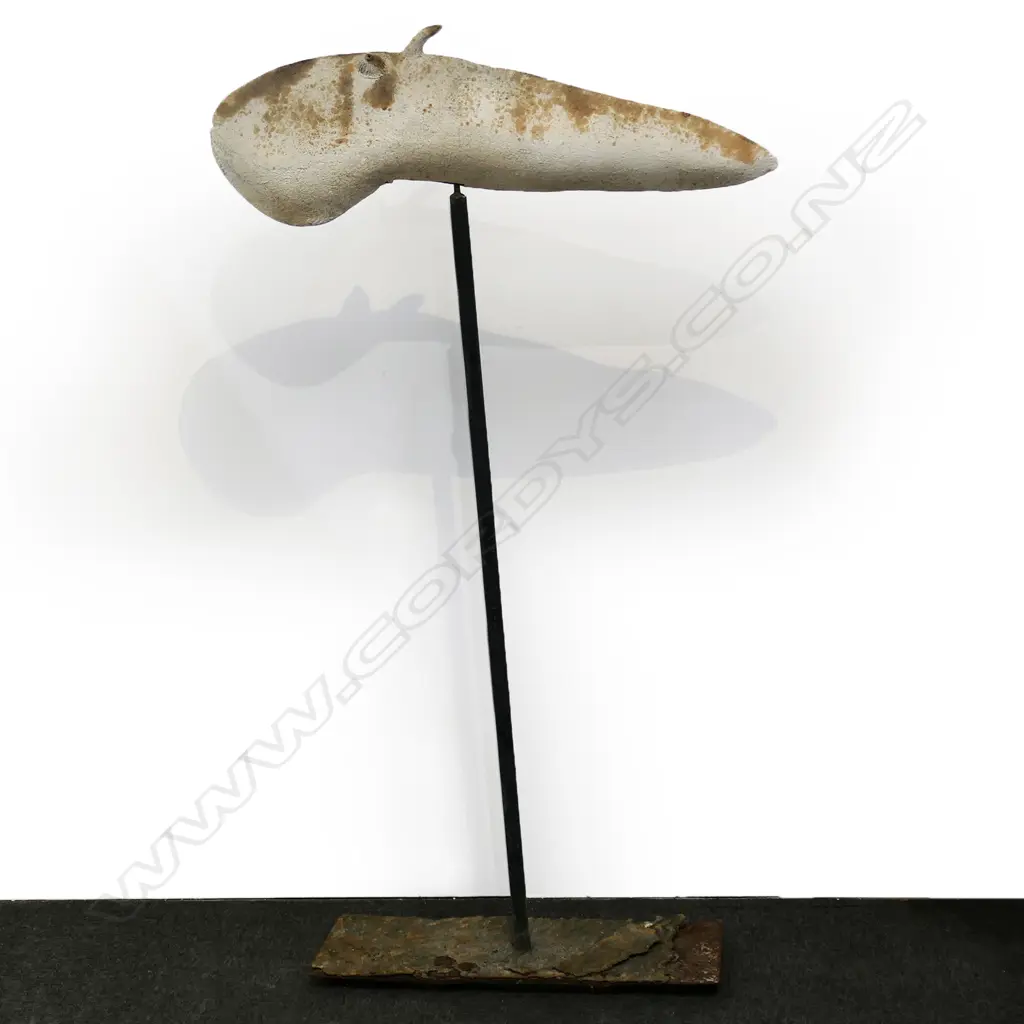 Steve Fullmer large fish sculpture on stand the fish with protruding eyes and of long tapered form, the pale body with brown highlights. L.910mm. Raised on a steel rod with rectangular wave top base, showing some rust and distress. H.1730. Image 1++