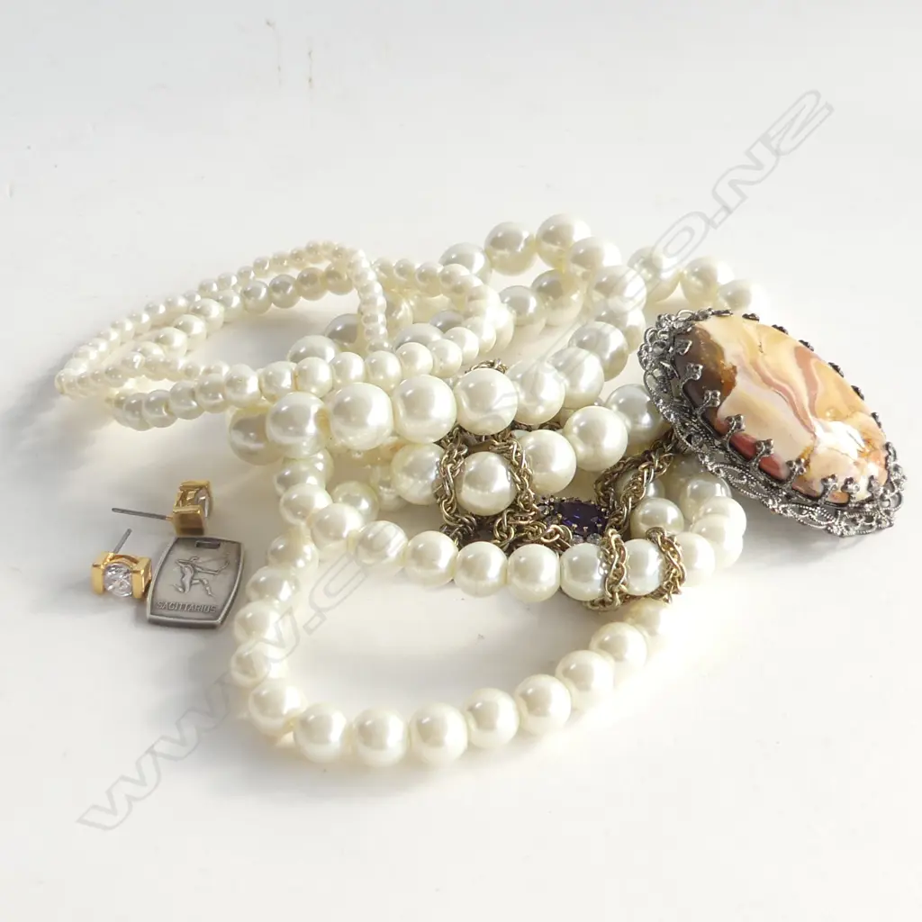 BAG ASST JEWELLERY; FAUX PEARL BRACELETS, 2.5GM STG SILVER SAGITTARIUS INGOT, PENDANTS, EARRINGS ..  Image 1++