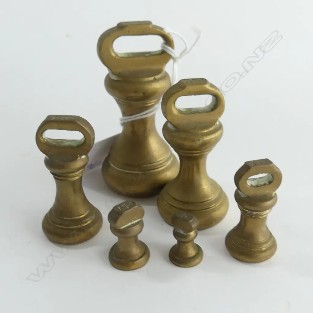 ANTIQUE SET 6 GRADUATED SMALL DUMBELL WEIGHTS  the lgest = 8oz. In tin w elephant lid Image 1++