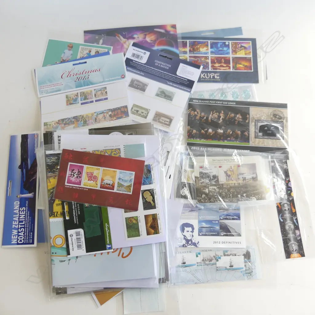 ASST. NZ STAMPS PACKS ETC $300 APPROX FACE VALUE Image 1++
