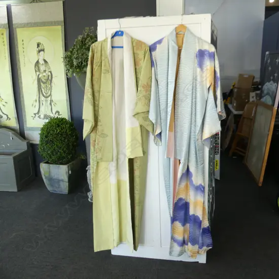 2 SILK KIMONOS, 1 GREEN WITH FLORALS, 1 SILVER & PURPLE