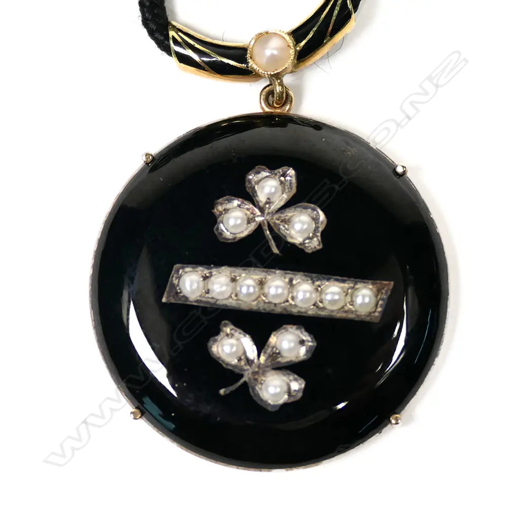 A 9ct gold and silver watch back pendant, Image 1++