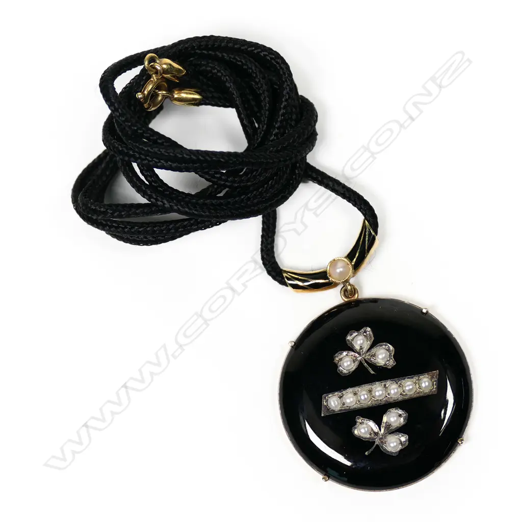 A 9ct gold and silver watch back pendant, Image 1++