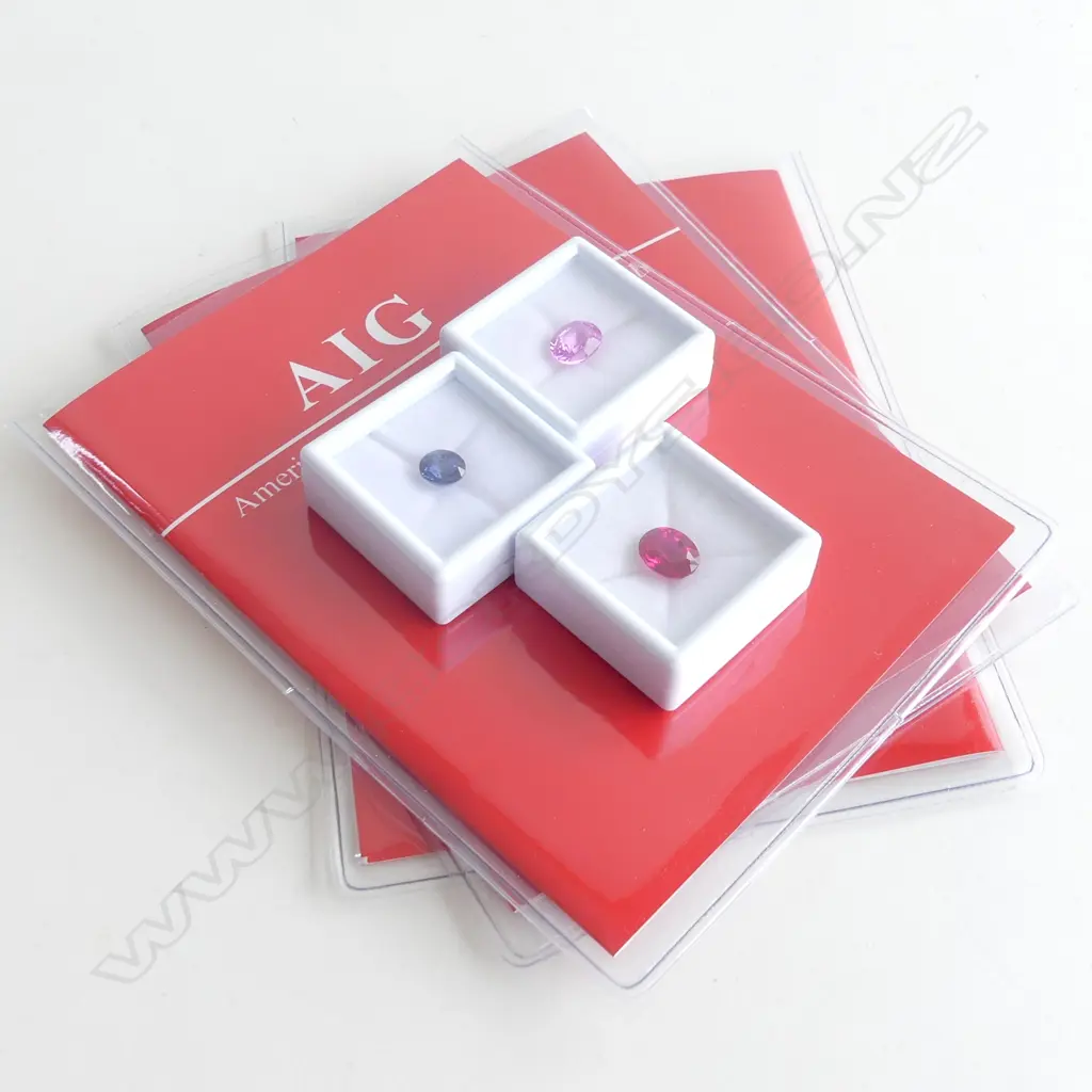 3 SYNTHETIC STONES; BLUE & PURPLE SAPPHIRE & RED RUBY - ALL WITH AIG GEMLAB REPORTS Image 1++
