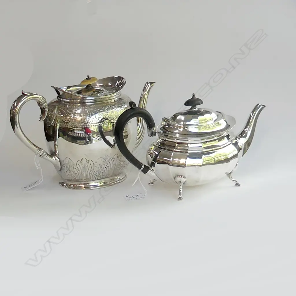 TWO SILVER PLATE TEA POTS Image 1++