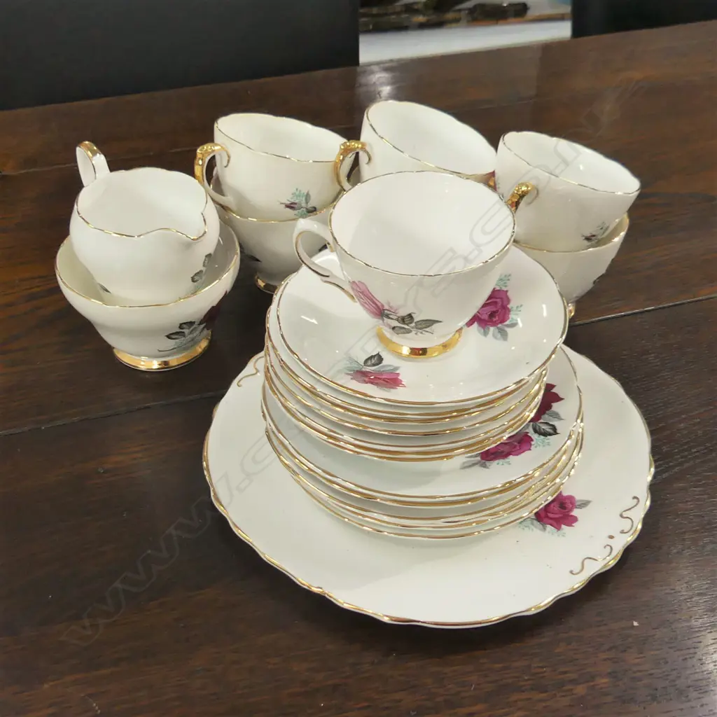 24 PCE COLCLOUGH TEA SET; 7 TRIOS, CAKE PLATE, MILK & SUGAR Image 1++