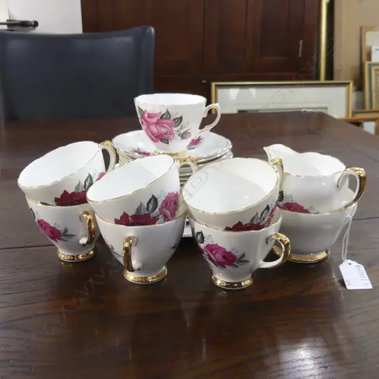 24 PCE COLCLOUGH TEA SET; 7 TRIOS, CAKE PLATE, MILK & SUGAR