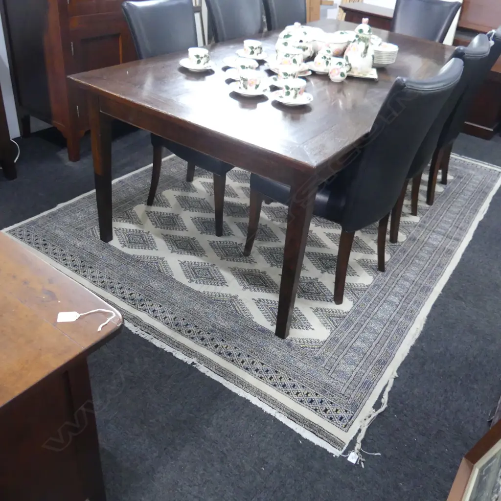 PAKISTANI BOKHARA HANDKNOTTED WOOL PILE RUG; many medallions on pale ivory ground 1800x2700mm some edges worn Image 1++