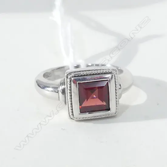 SILVER RING WITH RED STONE  (GARNET?)