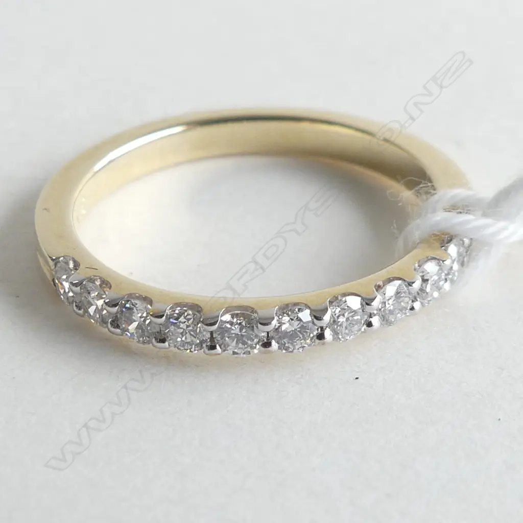 9CT YELLOW GOLD & DIAMOND CLAW SET BAND 1.7GMS (WITH VALUATION) Image 1++