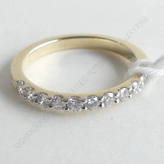 9CT YELLOW GOLD & DIAMOND CLAW SET BAND 1.7GMS (WITH VALUATION)