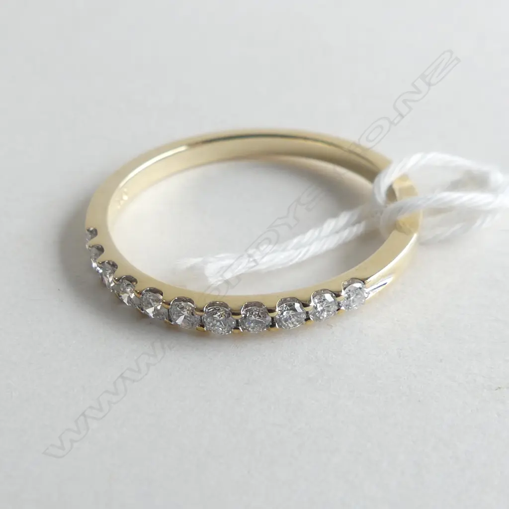 9CT YELLOW GOLD .33CT CLAW SET BAND 2.0 GMS (WITH VALUATION) Image 1++