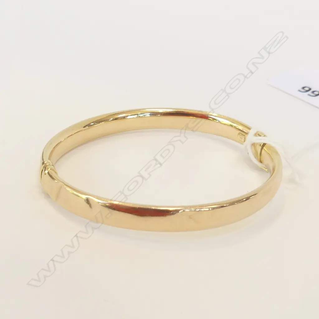 9CT GOLD HOLLOW HINGED BANGLE (WITH DENTS) 6.9GMS Image 1++