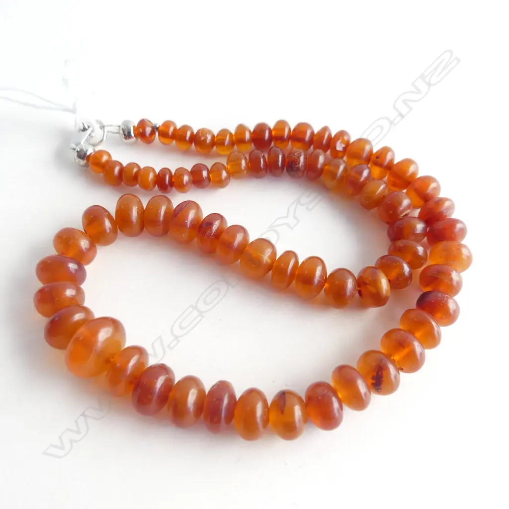 GRADUATED AMBER BEADS, STG SILVER CATCH  Image 1++