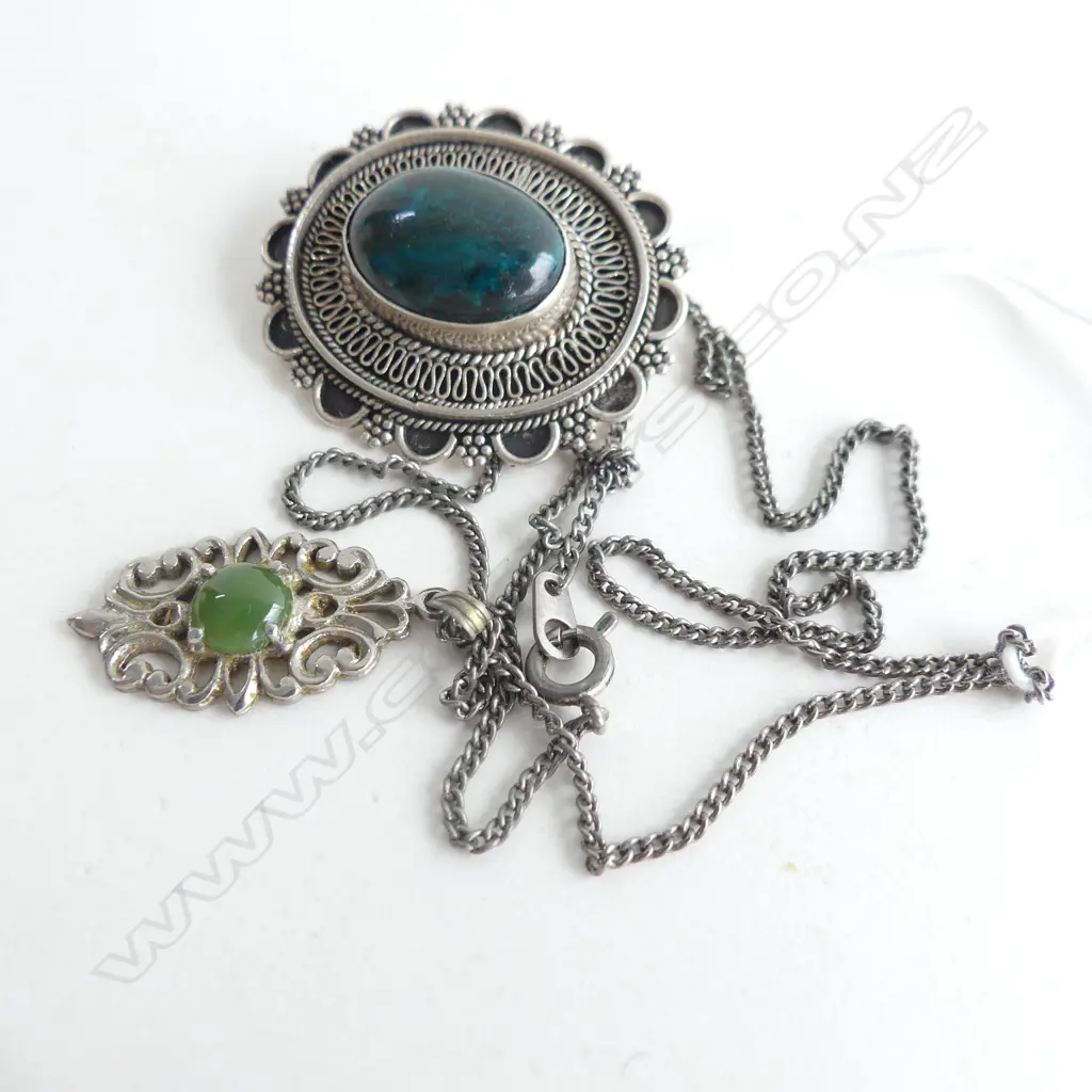 2 SILVER PENDANTS WITH GREEN STONES; BOTH ON SAME CHAIN Image 1++