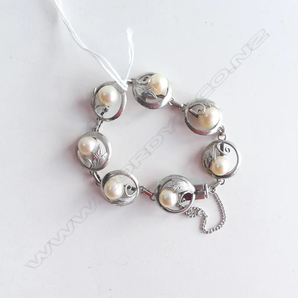 STG SILVER BRACELET SET WITH 7 PEARLS 22.53 GMS Image 1++