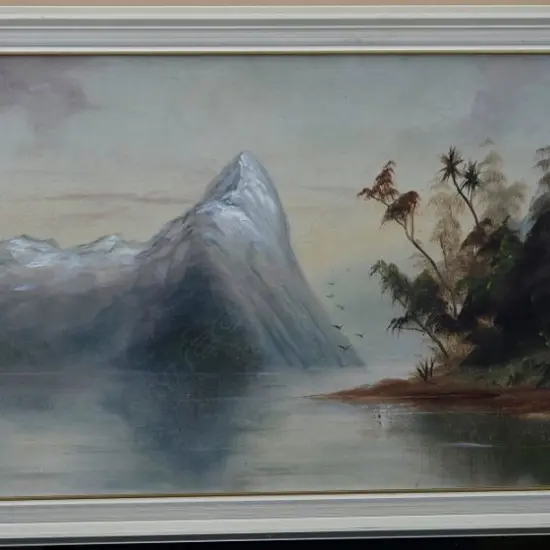 DE RITZ, George (NZ 1875-1953), Mitre Peak, South Island, Oil on board, signed, 330mm x 710mm