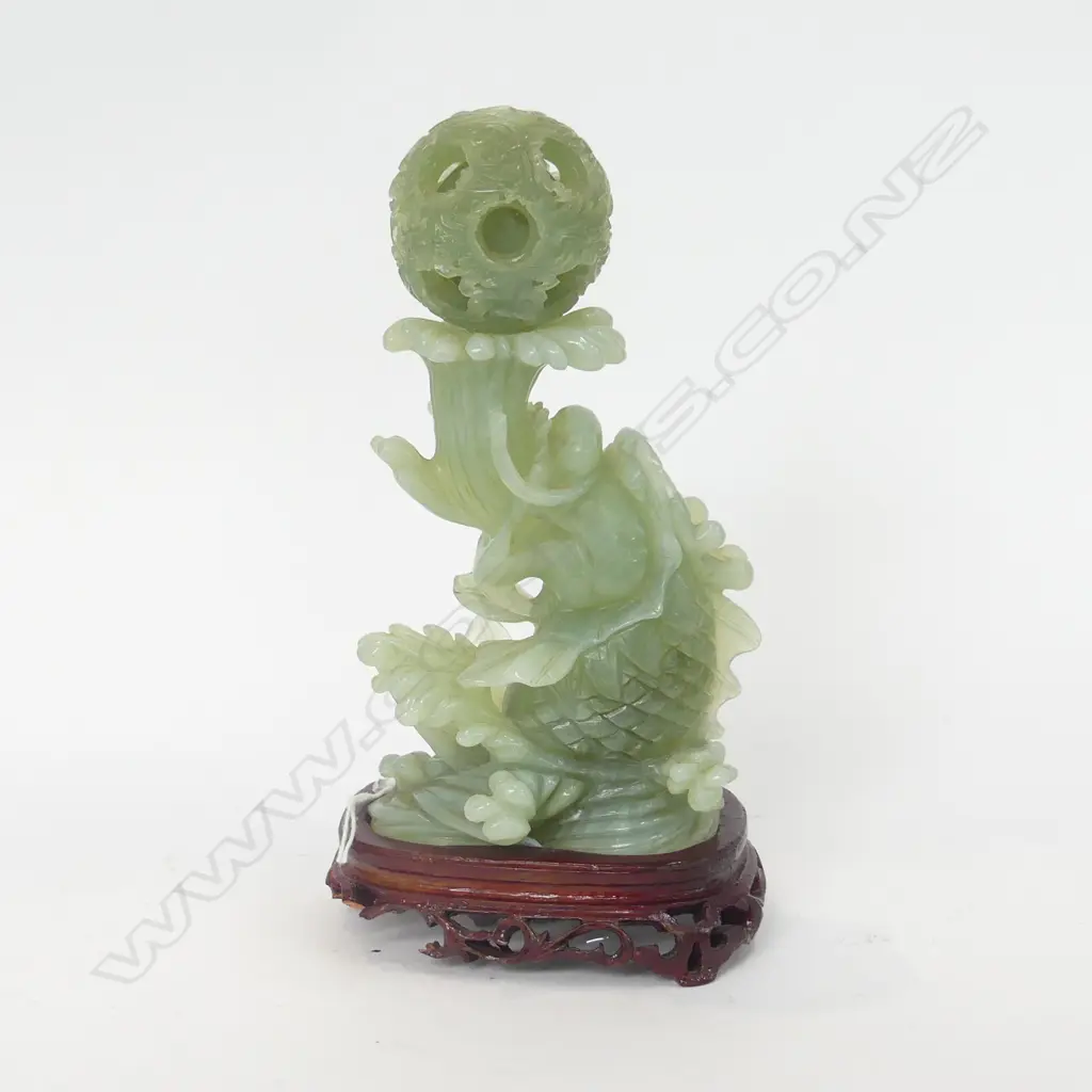 ORIENTAL JADE CARVED SCULPTURE WITH PUZZLE BALL, ON WOODEN STAND H. 210MM (BASE OF STAND A/F) Image 1++