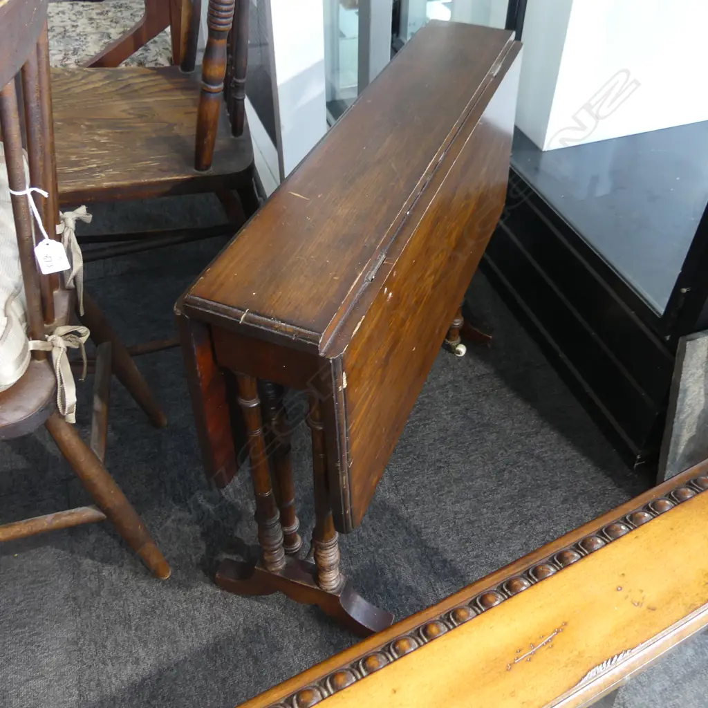 EDWARDIAN KAURI SUTHERLAND TABLE. ON TURNED LEGS TERMINATING IN WHITE POCELAIN CASTORS. H 680 TOP 680mm SQ. ( EXTENDED) Image 1++
