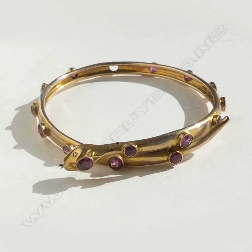 9CT GOLD FILLED (PLATED) SNAKE BANGLE W PURPLE STONES 1 MISSING. Pearl eyes Image 1++