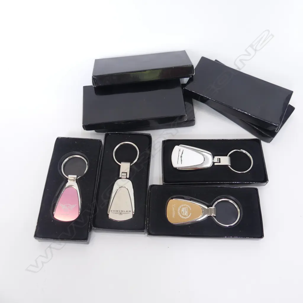 8 GM LICENSED COLOUR TEARDROP CAR KEY RINGS; CORVETTE, CADIALLAC, CHRYSLER ETC.. ALL NEW IN BOXES Image 1++