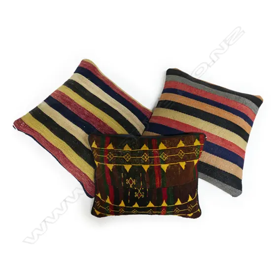 Three scatter cushions with old Turkish kilim faces and zipper closures. Sizes; two 400 x 400mm and one smaller at 360 x 300mm.