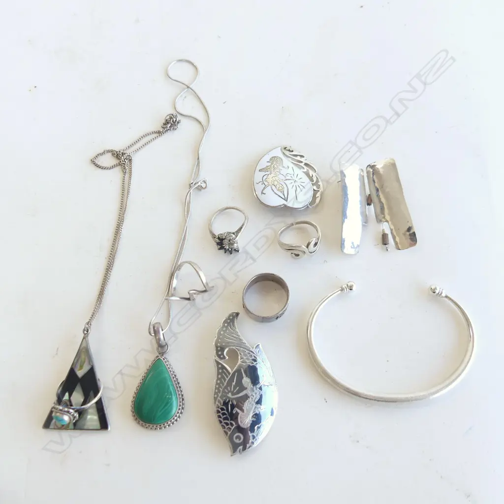 11 PCES ASST. STG JEWELLERY; 5 RINGS (2 AF), BANGLE, 2 THAI BROOCHES, PR EARRINGS, 2 NECKLACES 86 GRAMS Image 1++
