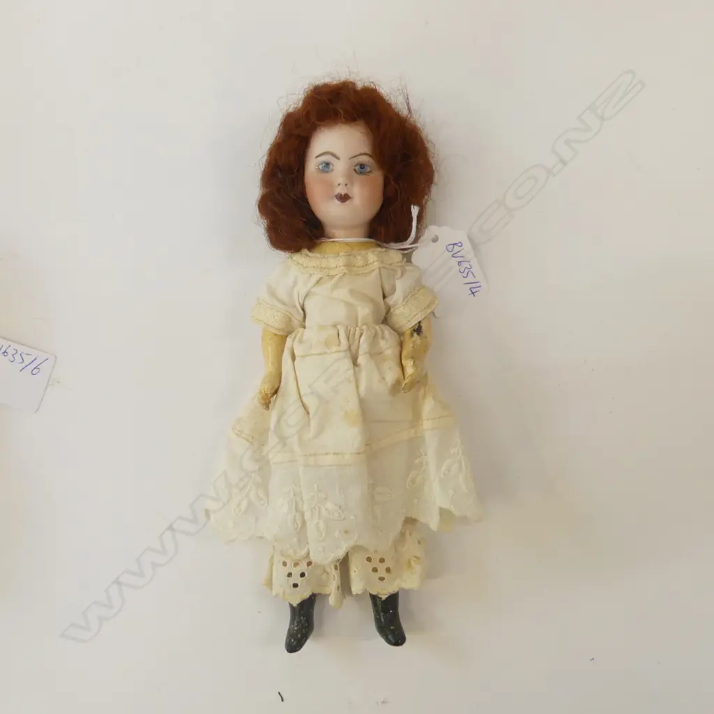VINTAGE SMALL PORCELIAN DOLL WITH RED WIG Image 1++
