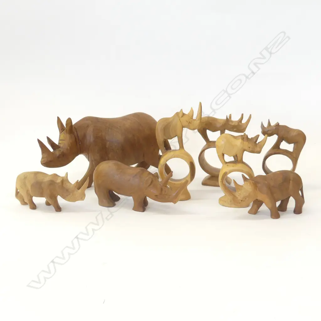 8 ASST CARVED WOODEN RHINO;S INCL 3 NAPKIN RINGS  Image 1++