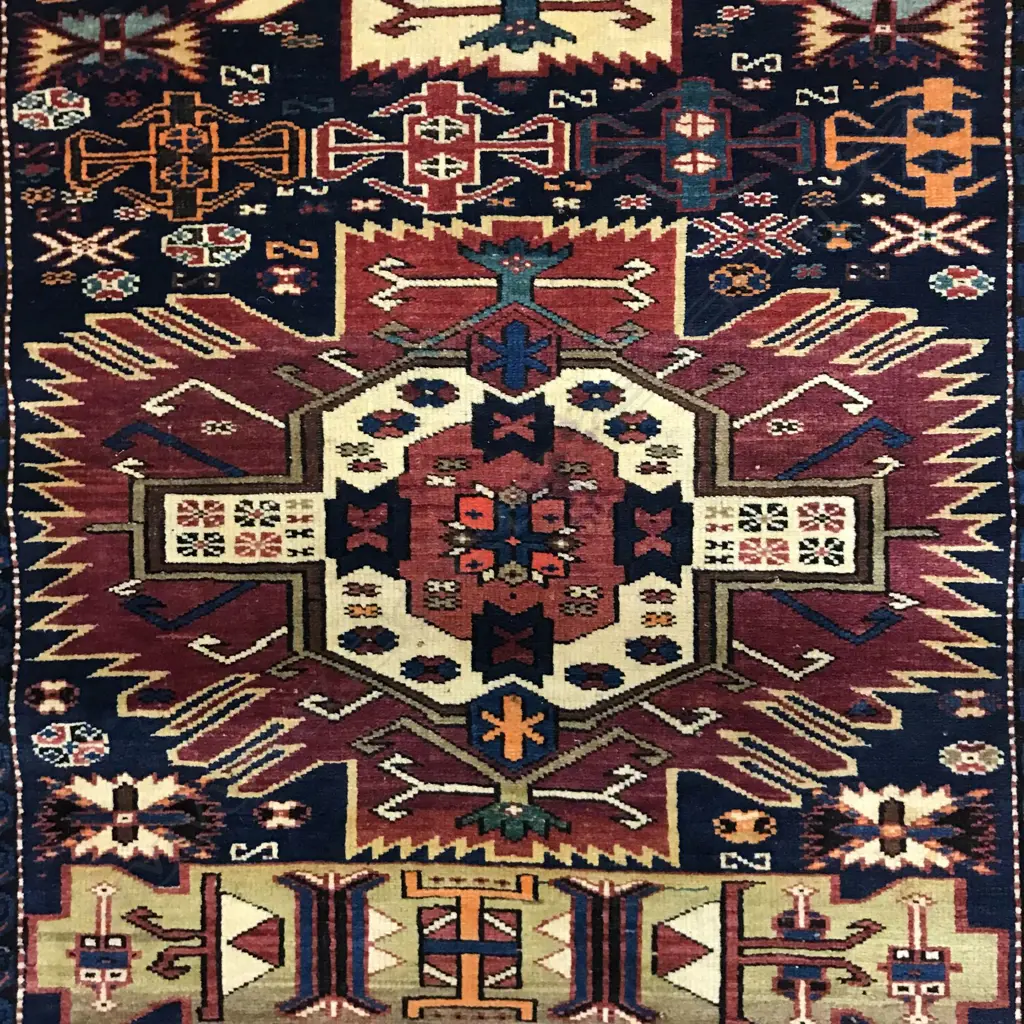 An outstanding Alikhanly, Kuba runner. [Possibly dated 1323 =1905 bottom left] 308 x 123cm Image 1++