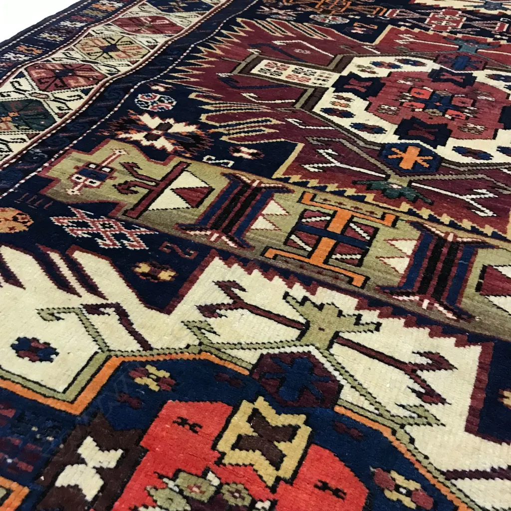 An outstanding Alikhanly, Kuba runner. [Possibly dated 1323 =1905 bottom left] 308 x 123cm Image 1++