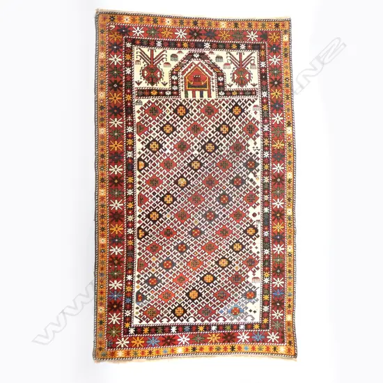 A Mihrabi Chukhanly, Shirvan prayer rug. Circa 1900. 173 x 105cm.