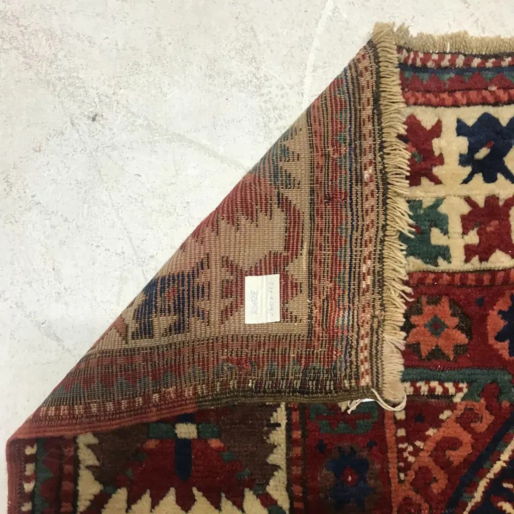 A Kadim Gyanja rug. 19th century. 260 x 132cm. Image 1++