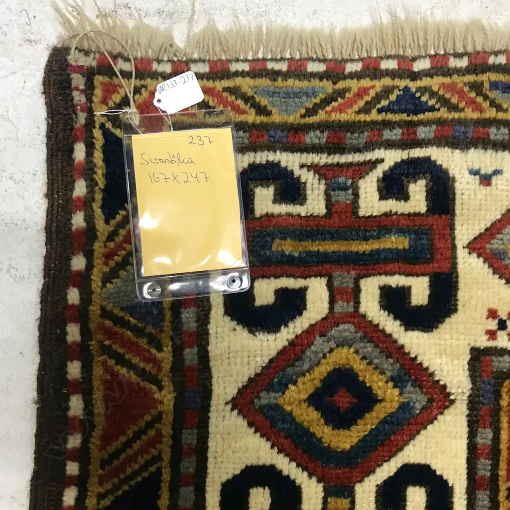 A Swastika Kazak rug. Late 19thC. 247 x 167cm. Image 1++