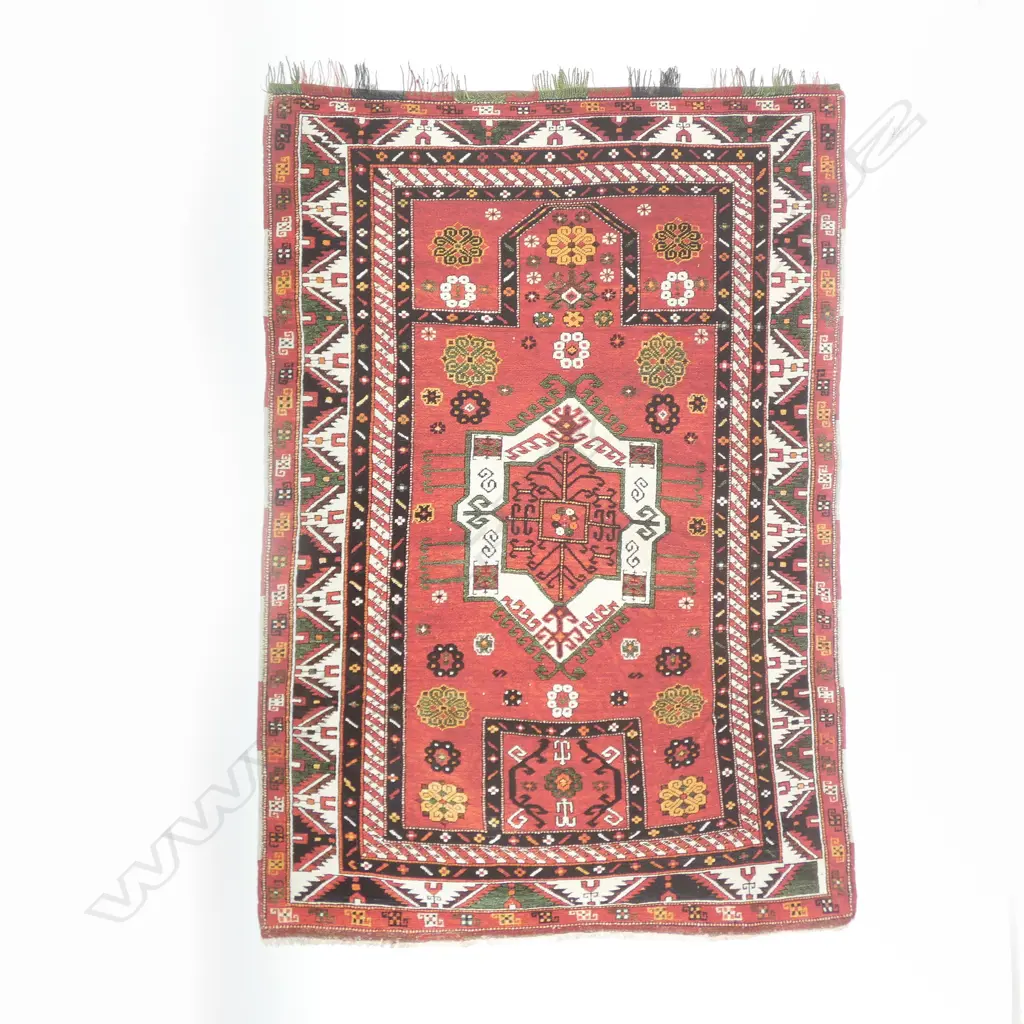 A Mihrabi Geychelli (Fakhraly Kazak) prayer rug. Late 19thC. 172 x 120cm. Image 1++