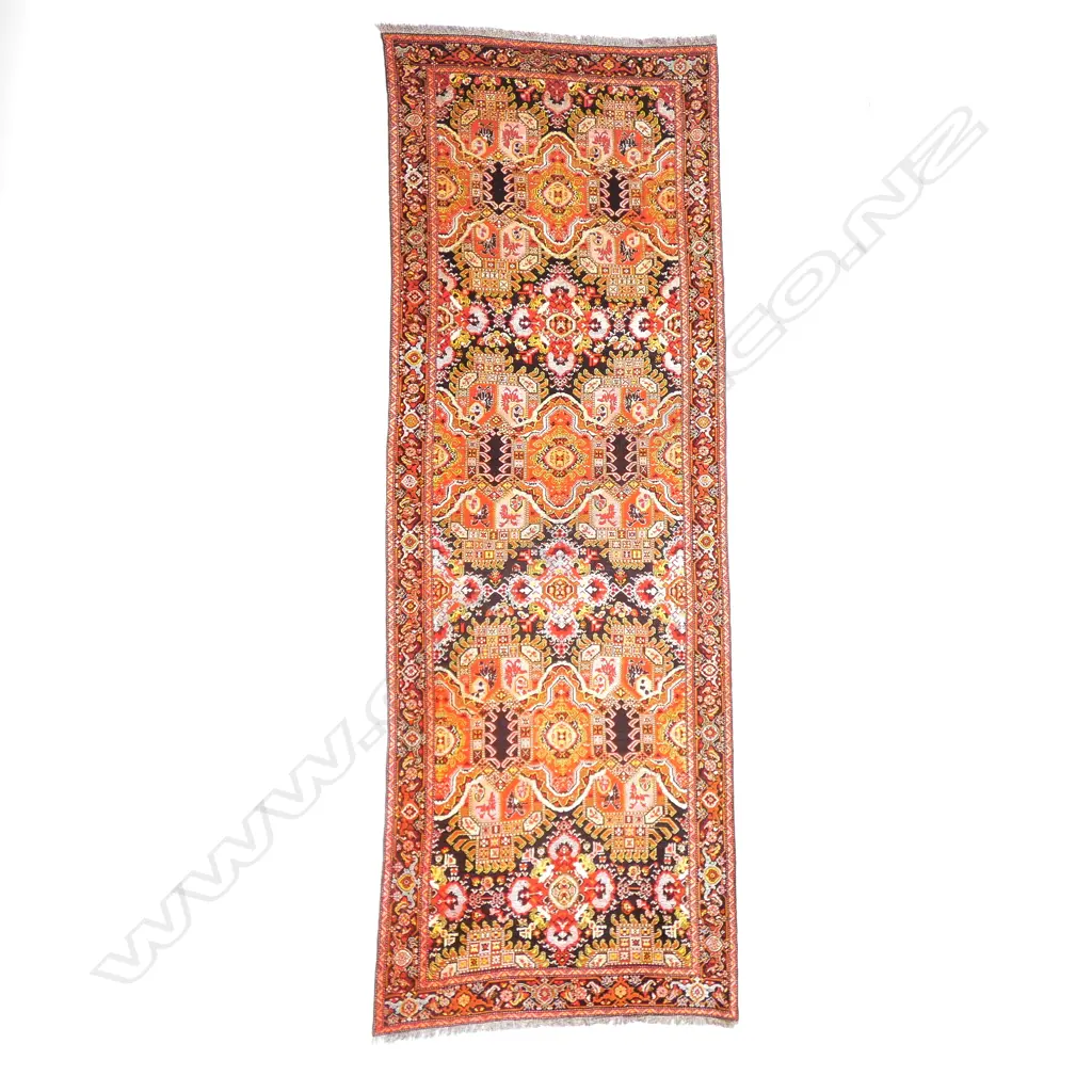 A large Gulmekhmer pattern Karabakh carpet. Beginning of the 20thC. 565 x 203cm. Image 1++