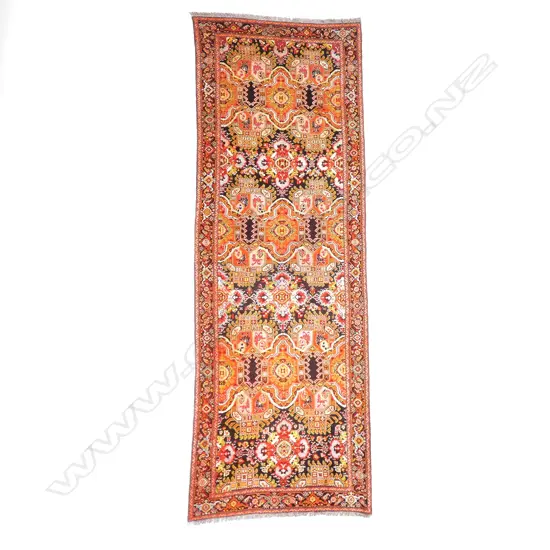 A large Gulmekhmer pattern Karabakh carpet. Beginning of the 20thC. 565 x 203cm.