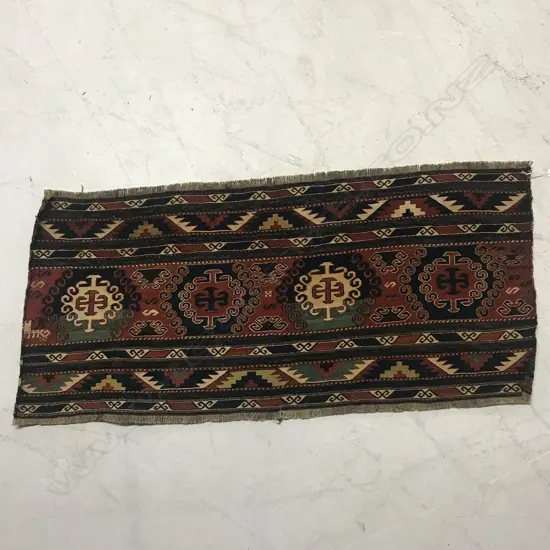 A small Soumak textile panel. 117 x 52cm.