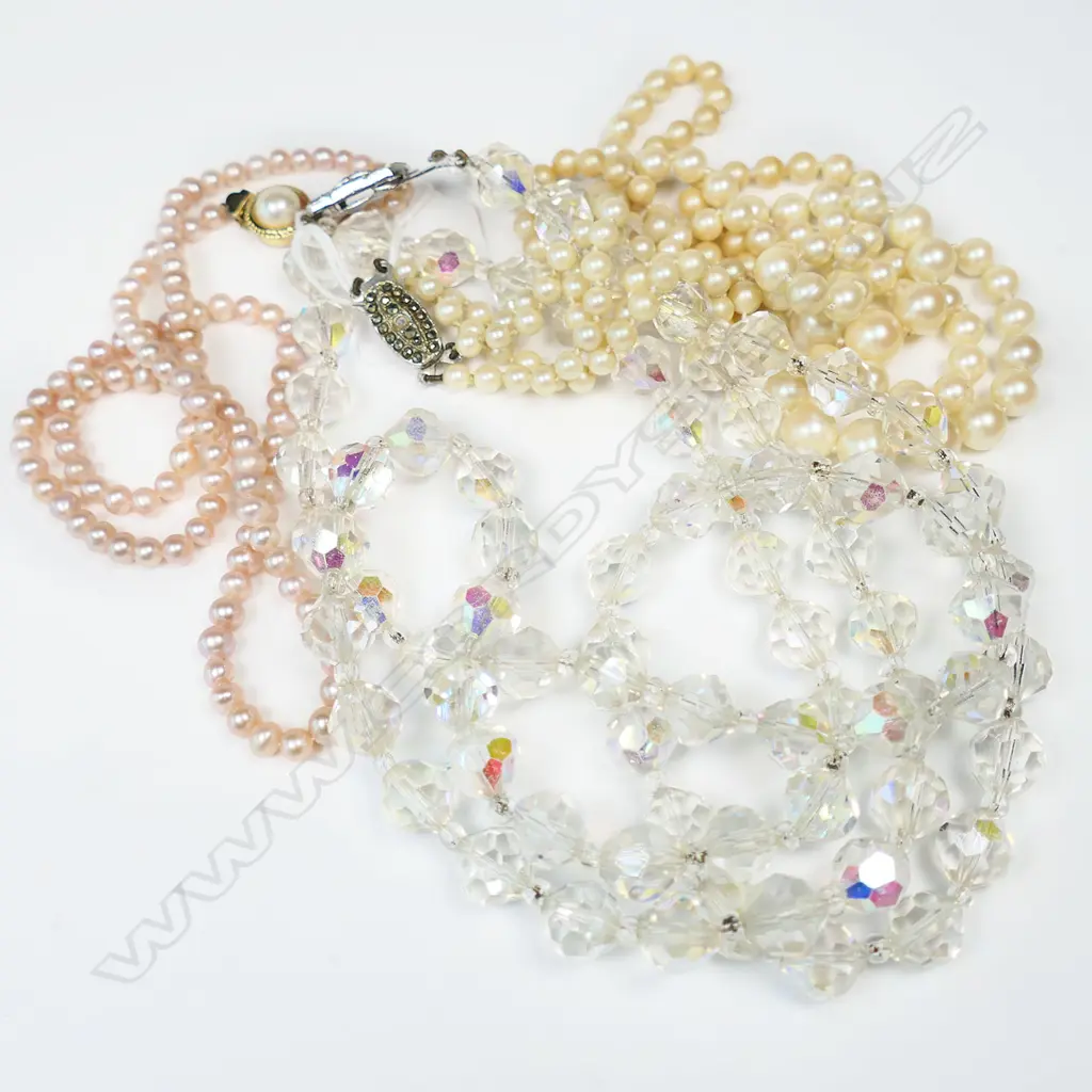 TWO PEARL NECKLACES AND A CRYSTAL NECKLACE Image 1++