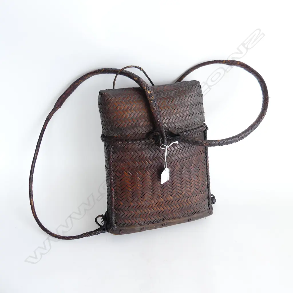 INDONESIAN RATTAN BACKPACK, late 20thc Image 1++
