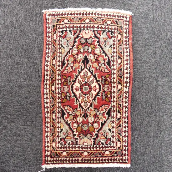 25M - SML PERSIAN HAND KNOTTED RUG 700 x 400mm