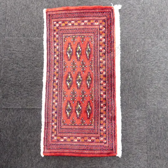 145A - SML PERSIAN HAND KNOTTED RUG 1030 x 480mm