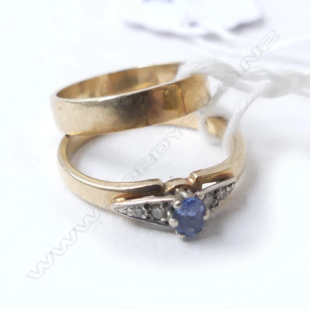 2 9ct GOLD RINGS, 1 w PALE BLUE STONE, size N, 1 WEDDER, size K Image 1++