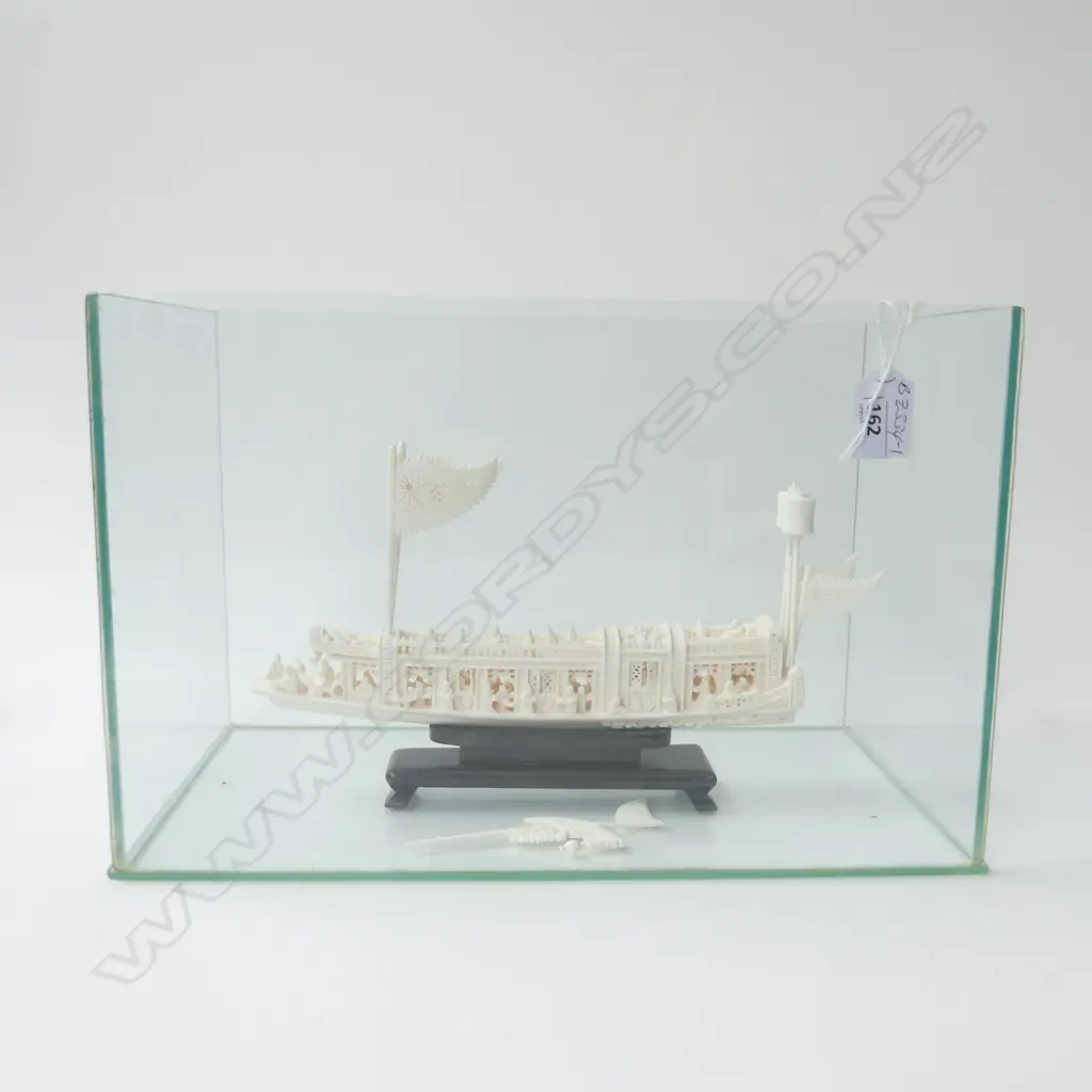 CARVED IVORY CHINESE FANCY JUNK BOAT w elaborate detail of figures balustrades sails etc L.280mm. On stand in glass case Image 1++